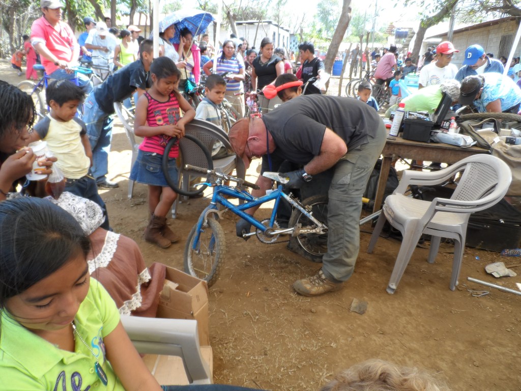 Steve McPhereson working on a bicycle.