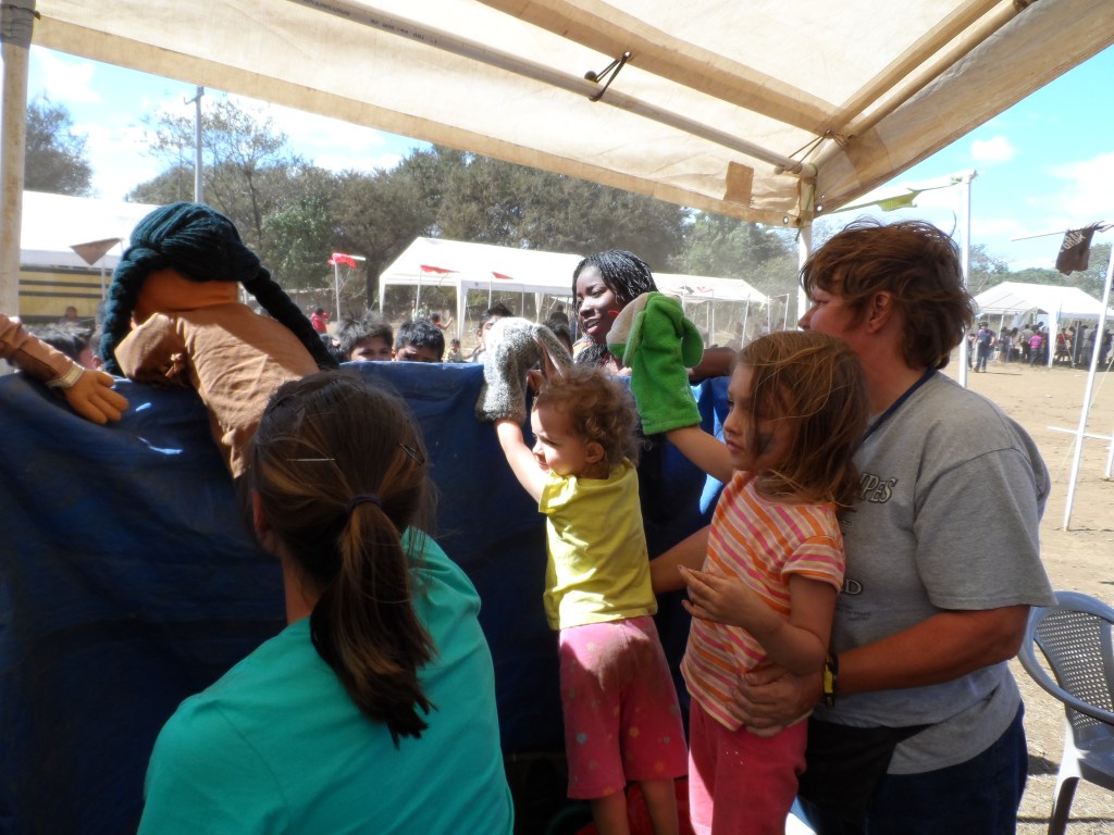 Emma & Paige doing puppets.